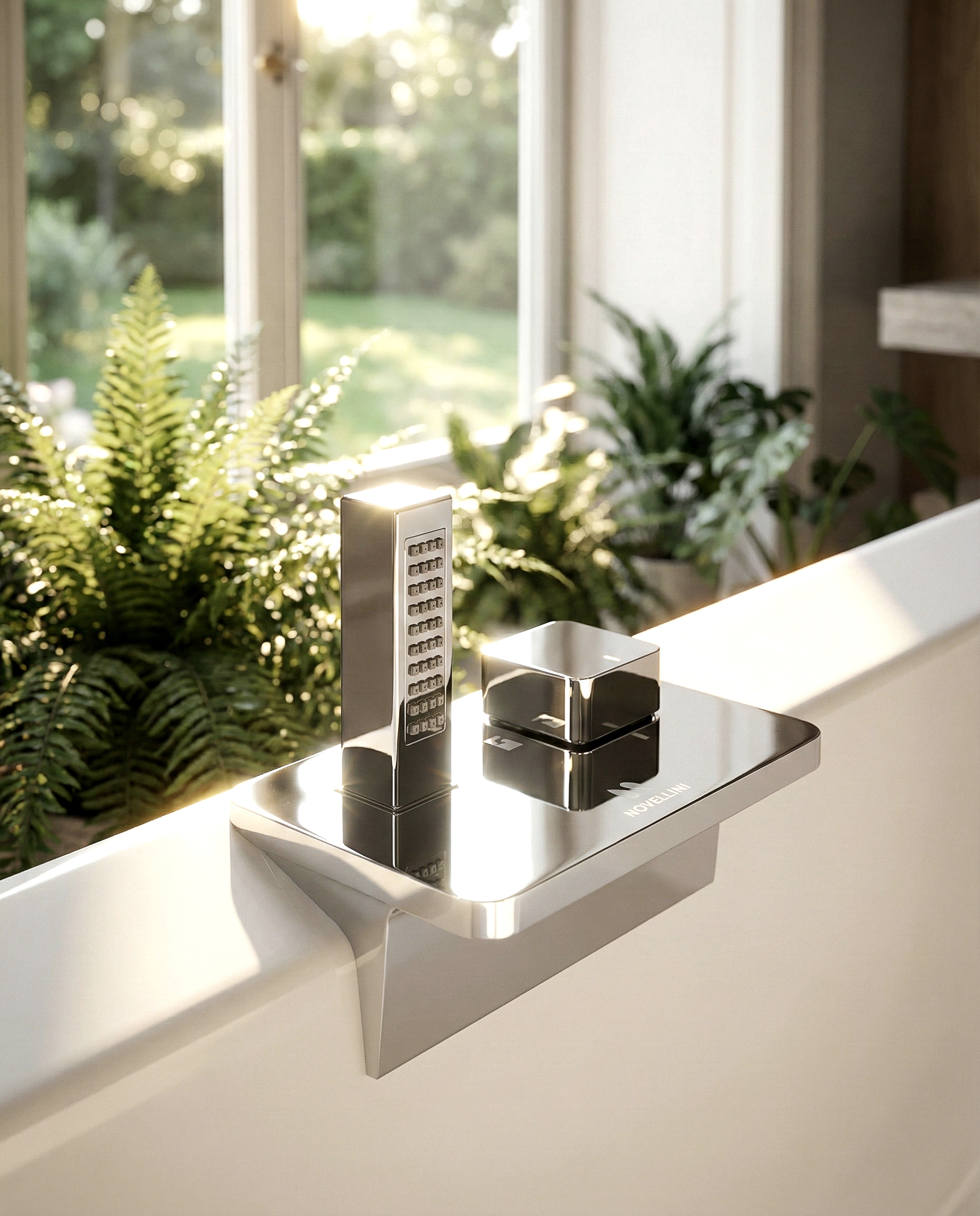 Gruppo vasca Serie D per Novellini: comando e doccetta su piastra da bordo vasca, finitura metallica, ambientazione bagno con luce naturale.