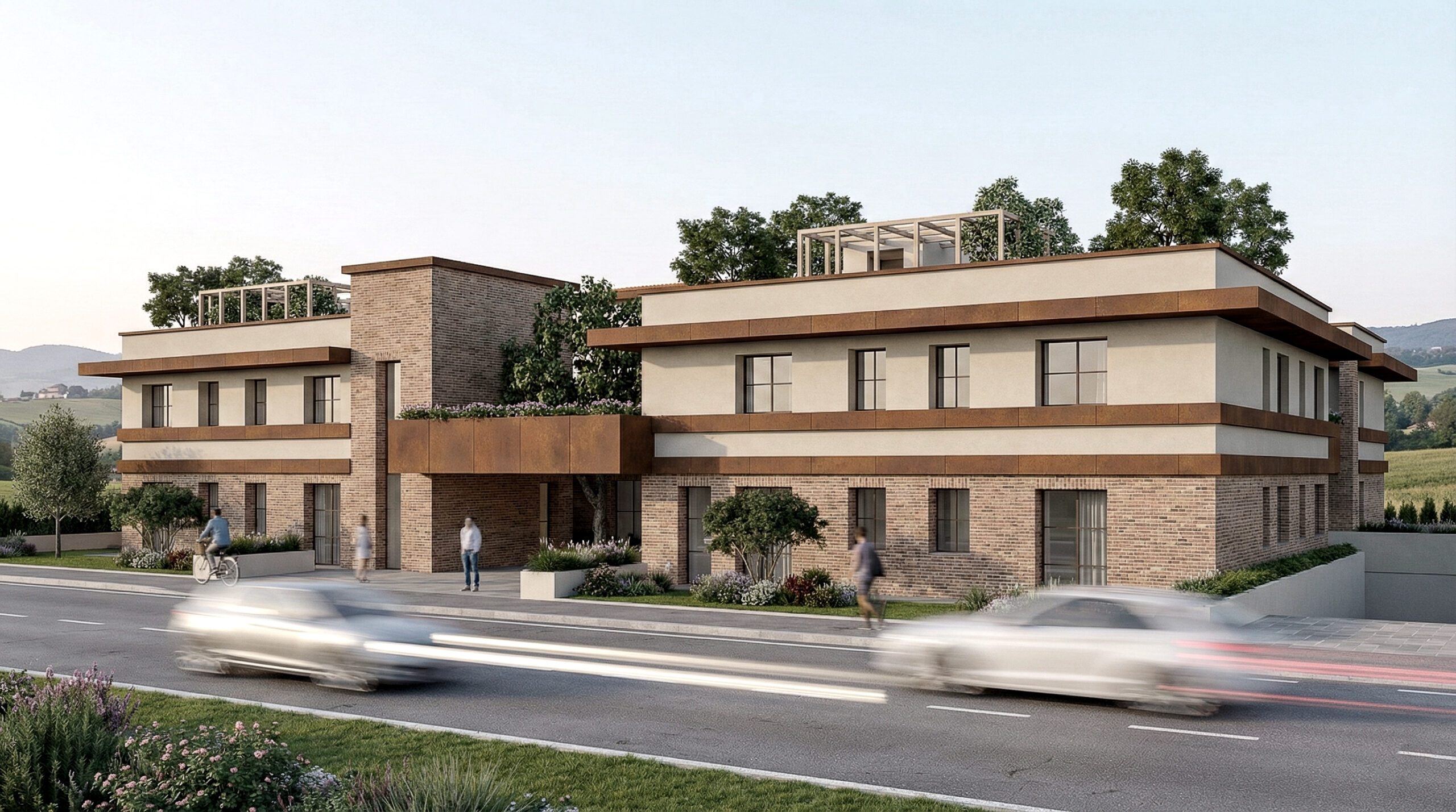 Fronte principale del complesso residenziale, con auto in movimento e fascia centrale.