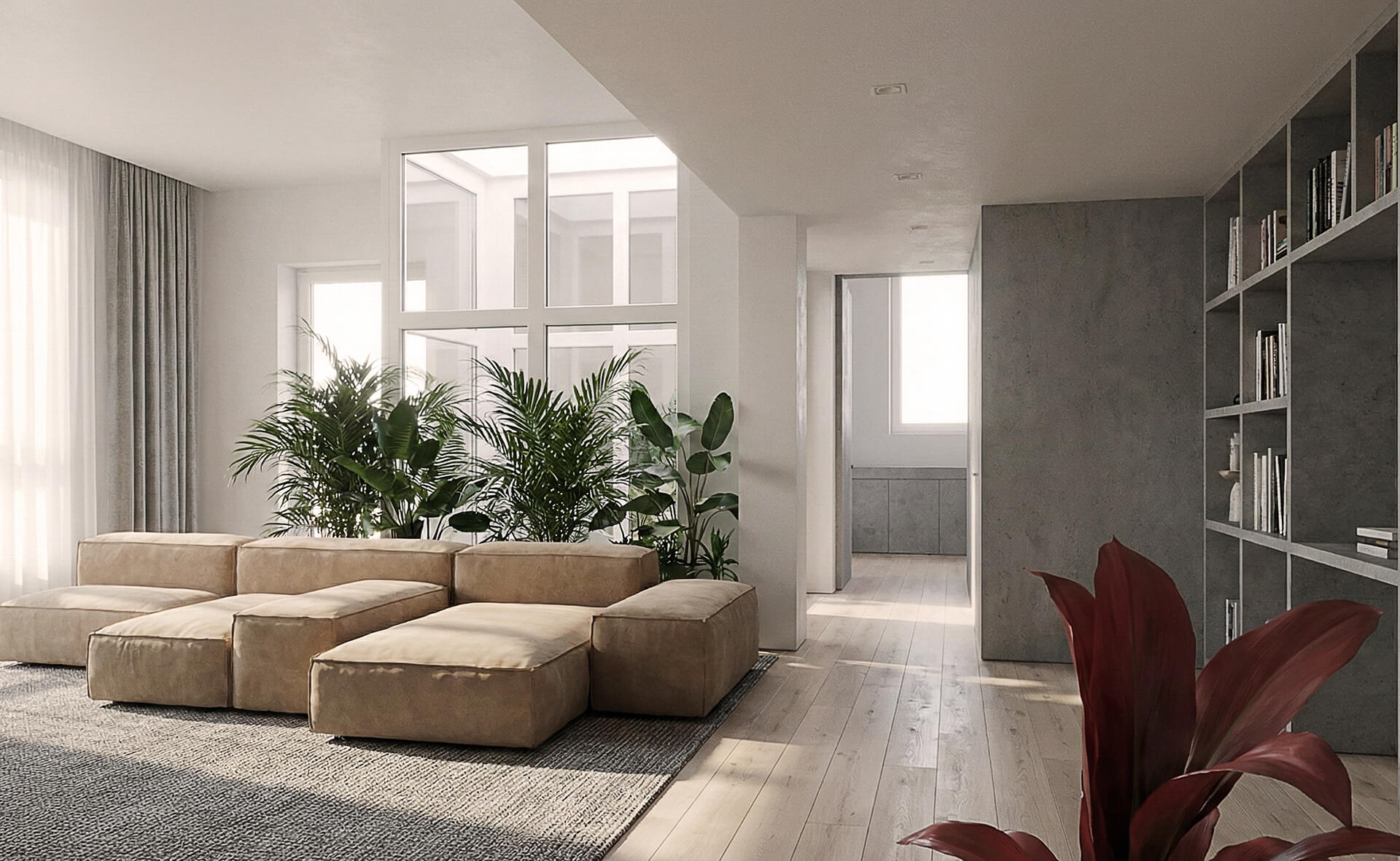 Living minimale con divano modulare e volume centrale vetrato; pavimento chiaro e libreria a parete.