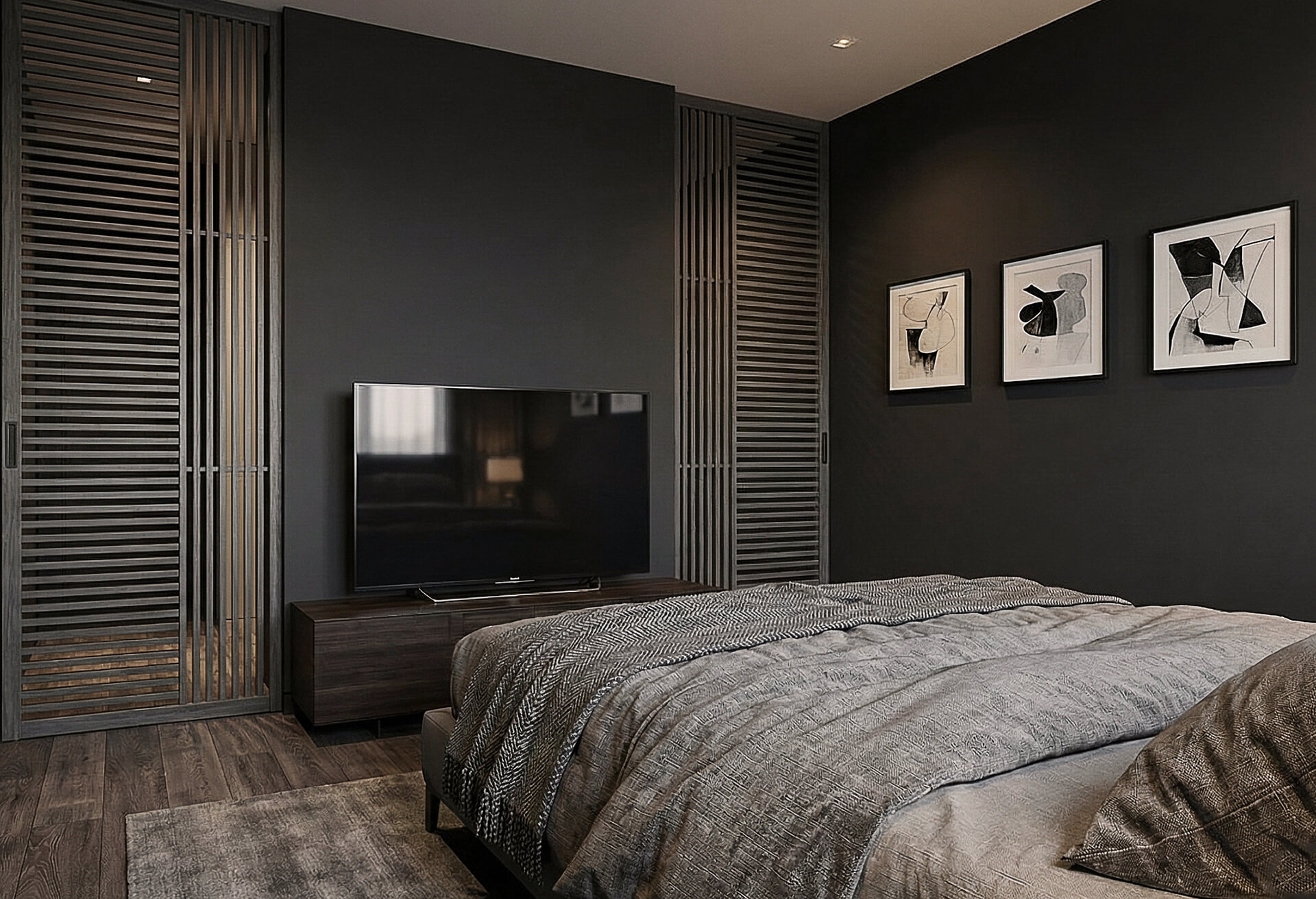 Camera da letto con pareti scure, elementi a doghe verticali, TV su mobile basso e letto con tessili grigi.